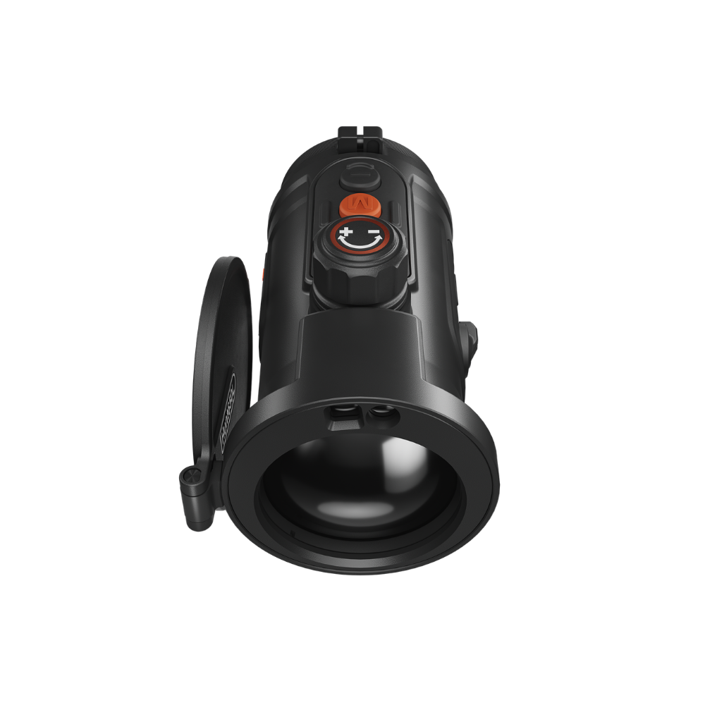 A black thermal scope with orange accents, featuring a textured adjustment knob, and a mounted base.