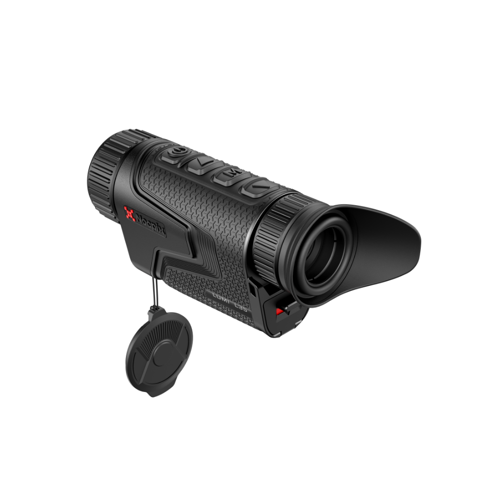 A black spotting scope with a matching black lens cap hanging from a short cord, shown against.