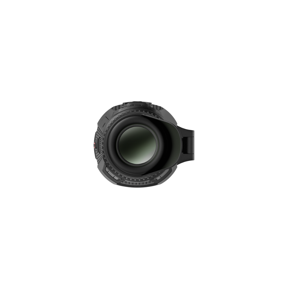 A close-up, top-down view of a black circular lens with a textured outer rim