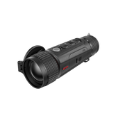 A black monocular device with a large front lens, textured grip, side buttons, and a small red Vista logo.