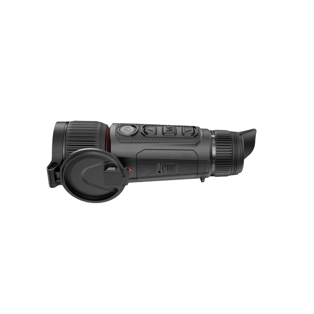 A black thermal monocular device with its lens cap removed and resting beside the body.