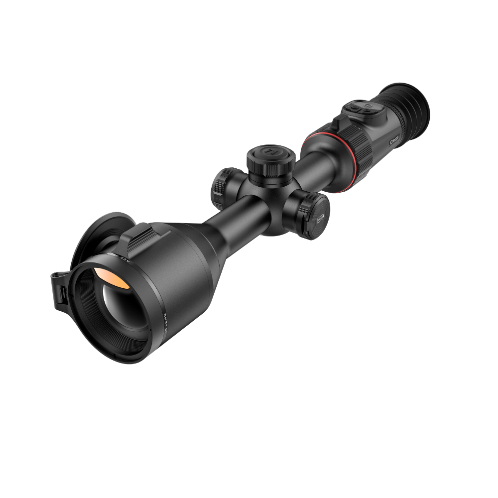 A black thermal rifle scope with a flip-down eyepiece cover, shown at a diagonal angle.