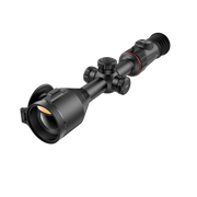 A black thermal rifle scope with a flip-down eyepiece cover, shown at a diagonal angle.
