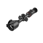 A black thermal scope rifle sight with a flip-down protective lens cover, shown at a diagonal angle.