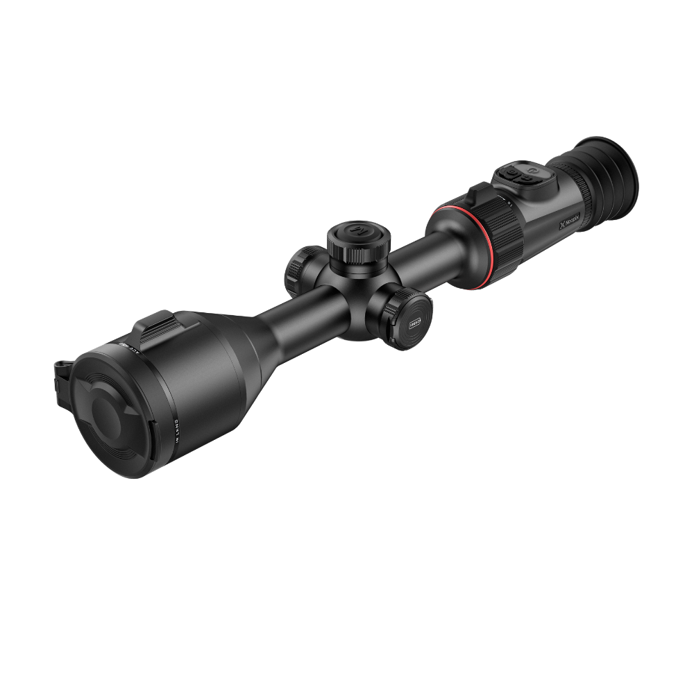 A black thermal rifle scope with adjustment knobs and a small red accent ring.