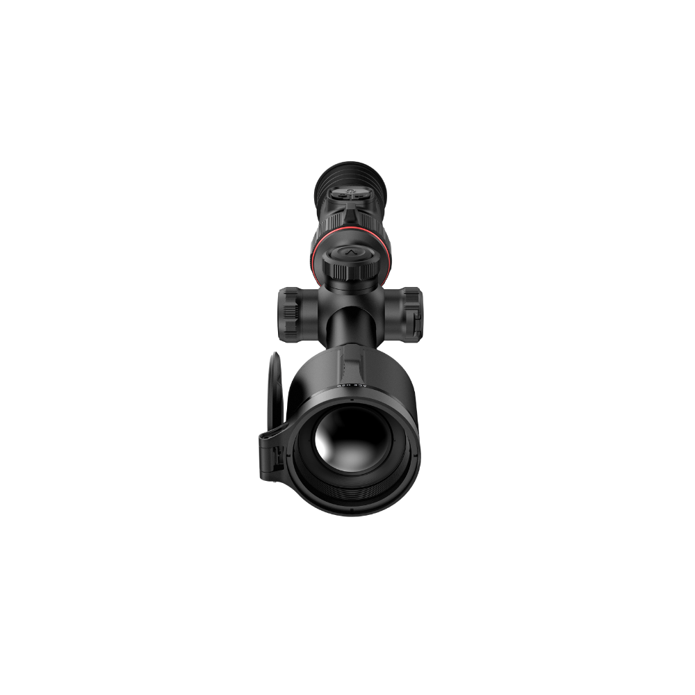A black rifle scope with a flip-up lens cover, shown from a front-facing perspective.