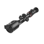 A black thermal rifle scope with a red accent ring, shown at a diagonal angle.