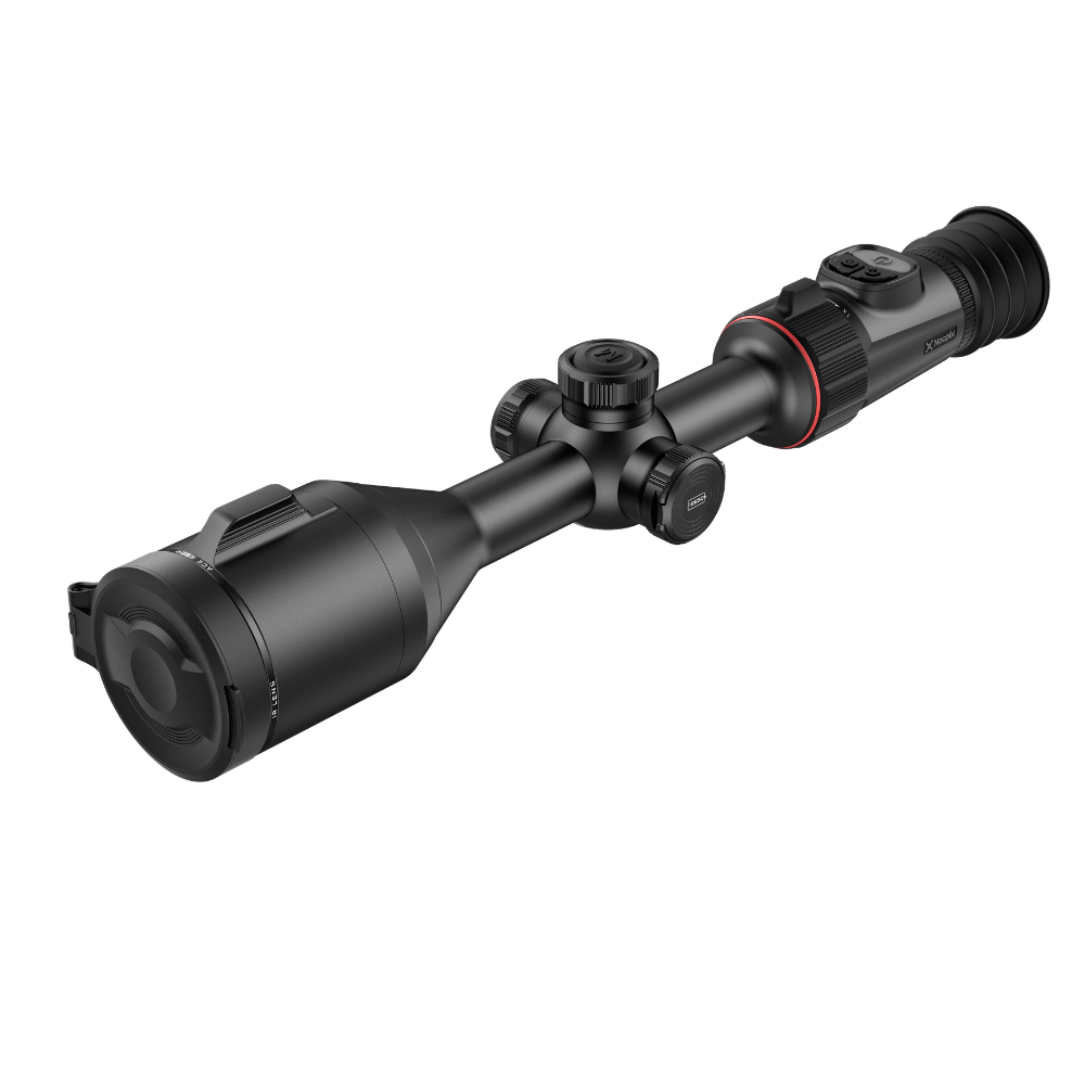 A black rifle scope with a red accent ring, shown at an angle.