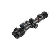 A black thermal scope rifle sight with a red ring accent and a lens cover.