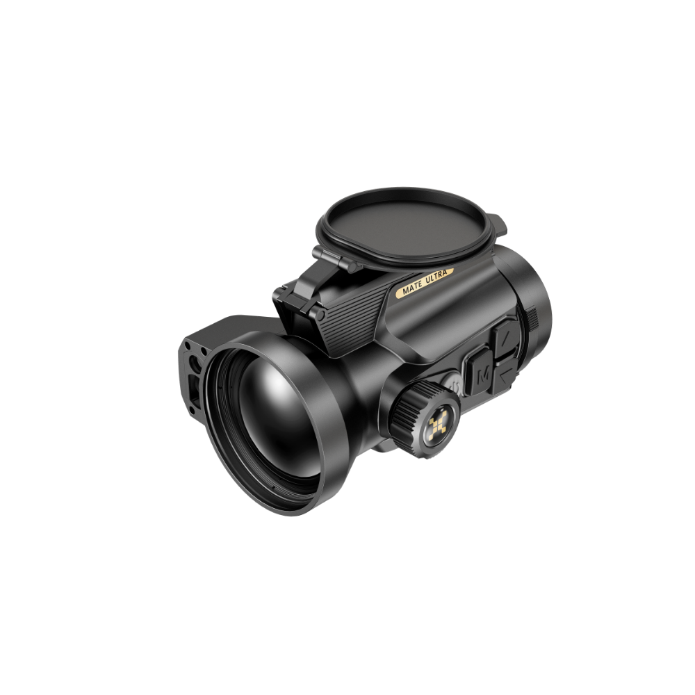 A black thermal clip-on with a large objective lens, adjustment dials, and a circular lens cover. The brand name 'MATE ULTRA' is visible in gold lettering on the side.