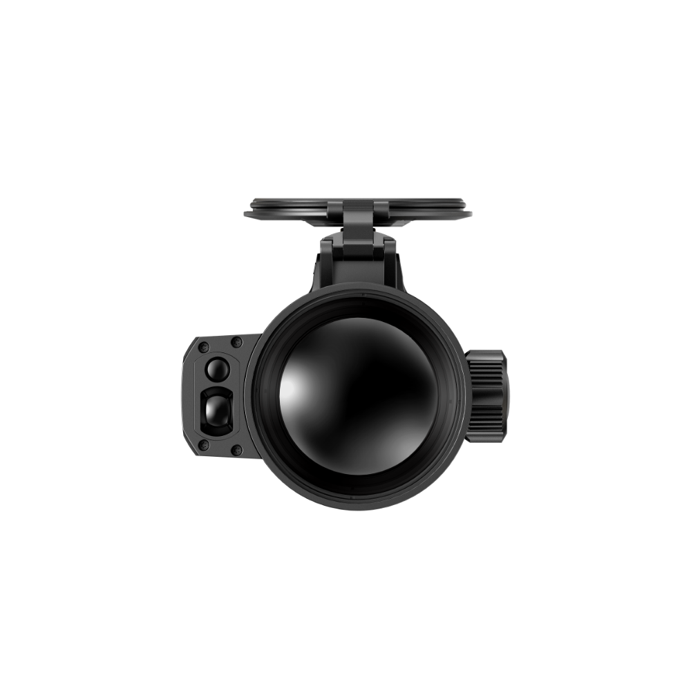 A black thermal clip-on with a mounted flip-up cover and side adjustment knobs, shown from a top-down perspective.