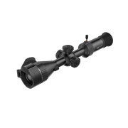 A black thermal scope with adjustment knobs and a small red switch, shown at an angle.