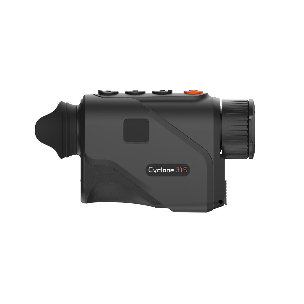 A black Cyclone 315 thermal imaging monocular with a textured grip, side button, and an orange accent button, shown from a side angle.