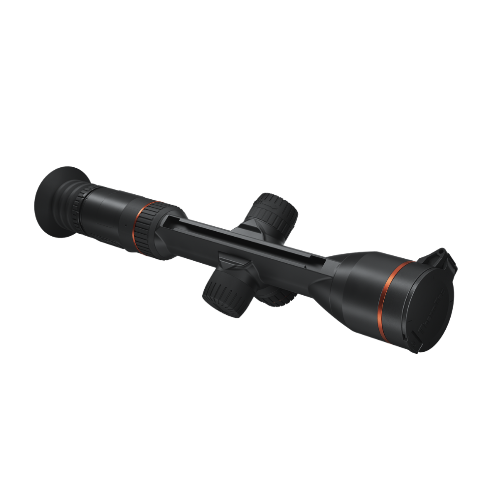 A black thermal scope device with a cylindrical body, textured adjustment knobs, and thin orange accent rings, shown.