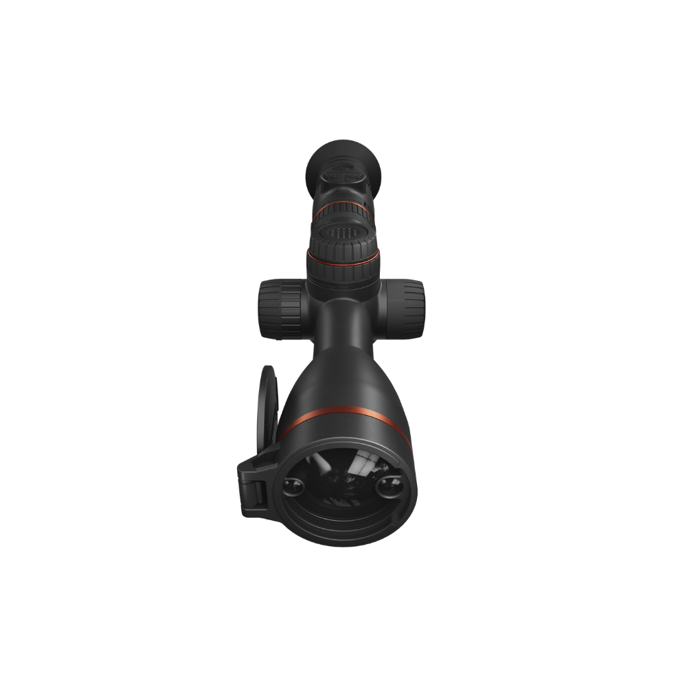 A black rifle scope with a large front lens, adjustment knobs, and a small attached accessory piece.