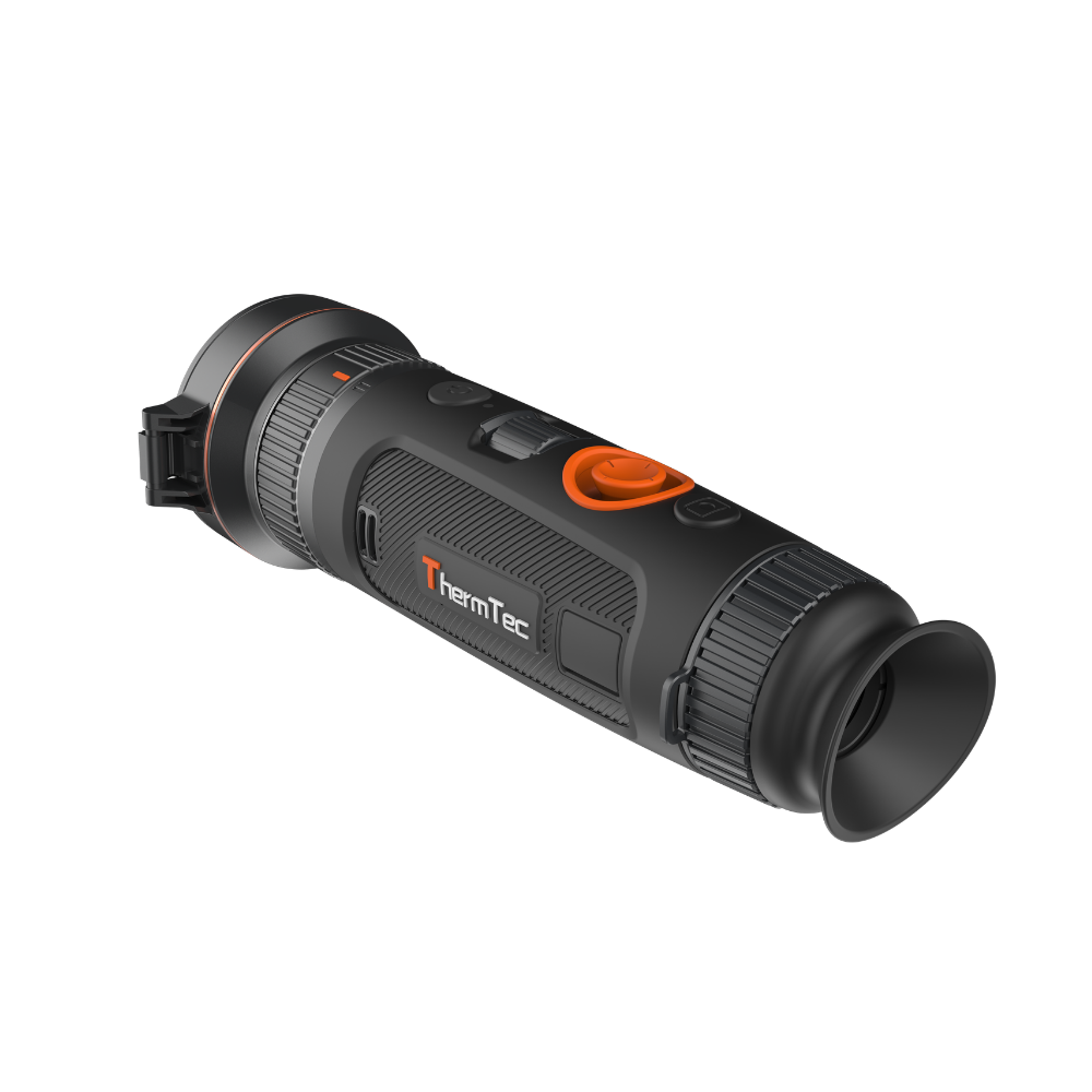 A thermal monocular with a black body, orange accents, and a clear objective lens, shown at an angle.