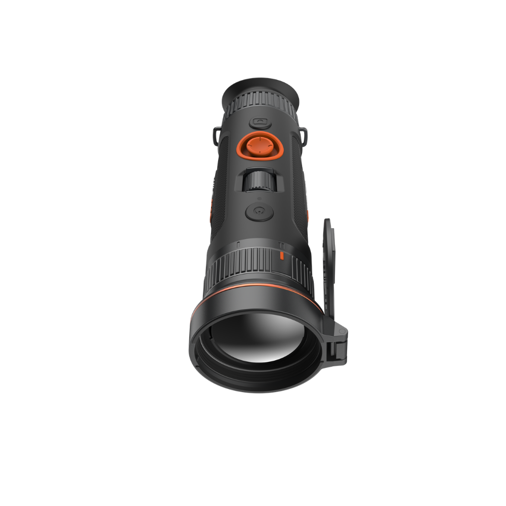 A thermal monocular with a black body, orange accents, and a clear objective lens, shown at an angle.